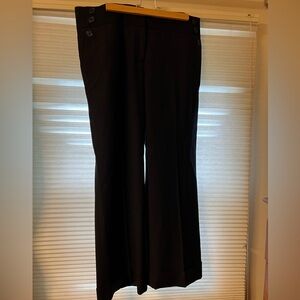 Dress slacks with cute black buttons on the side.